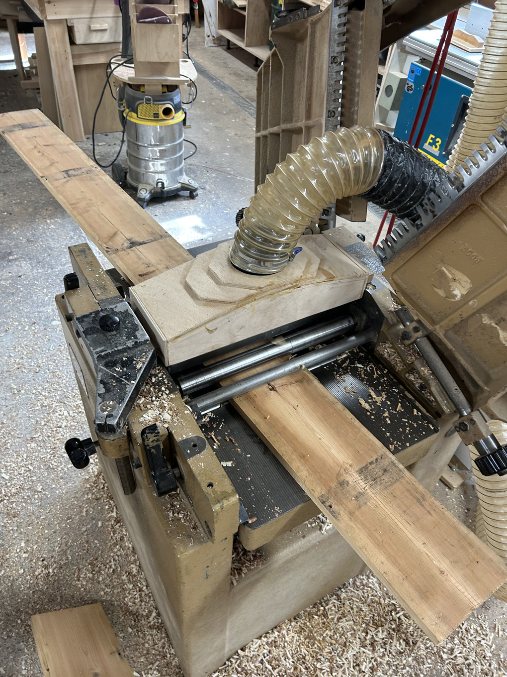 Equipment to test the thickness of an old floorboard.