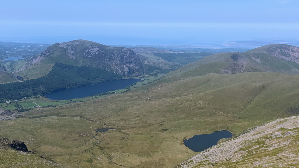 View from the top of Snowdon on one of the hottest days of the year, the 2 lakes seen were cricial in cooling down on the way down! Visability wasn't great but still a stunning view!