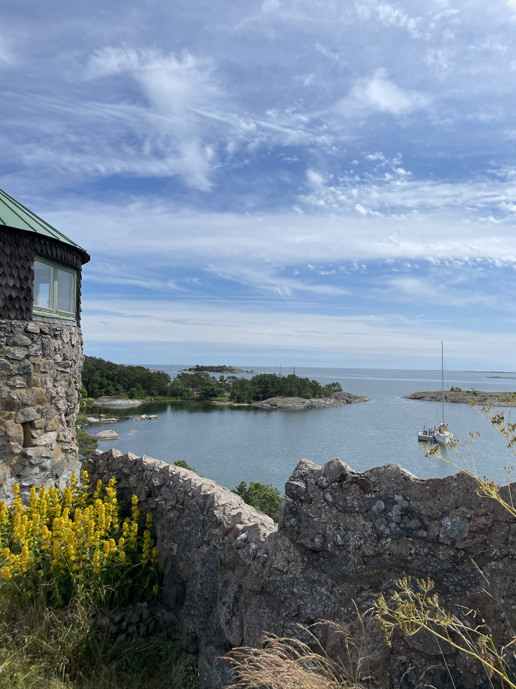 Sunny view of a bay from a hill.