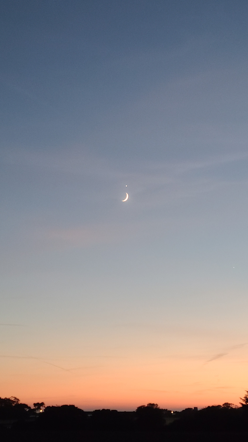 The moon and Venus made a lowercase j in the sky, over a gorgeous sunset.