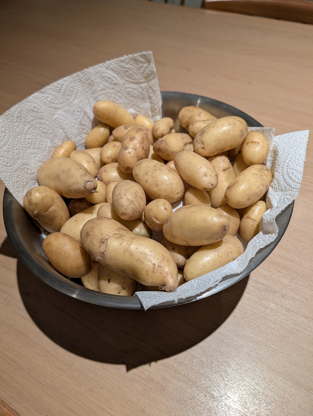 A bowl of early crop potatoes