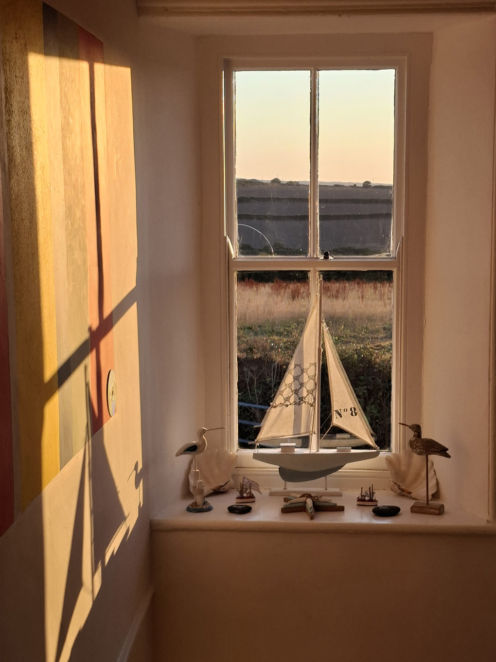 sunrise colours, wooden ship