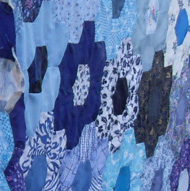 Blue hexagon patchwork hanging on a washing line