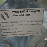 Neonatal unit card describing newborn son.