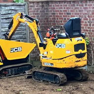 my garden after the digger and mini dump truch have been over it for 1-day! What a brown muddy mess!