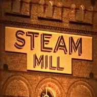 Old steam mill in Chester at sunset/twillight with Venus in the sky to the left.